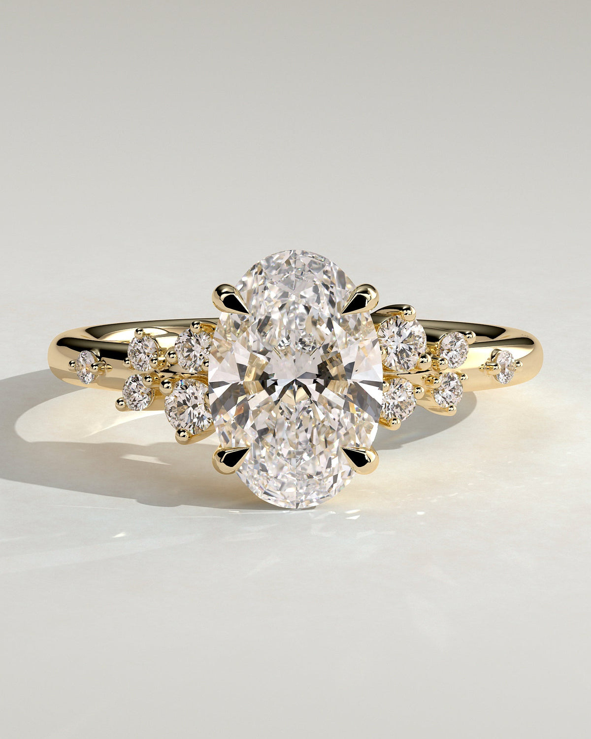 Celestia – Ovaler Solitär Verlobungsring mit Seitensteinen in 14k/18k Gelbgold mit Labordiamant | Élysée Diamonds